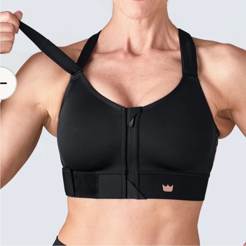 SHEFIT Women's High-Support Front-Zip Sports Bra in Black with Pink Logo